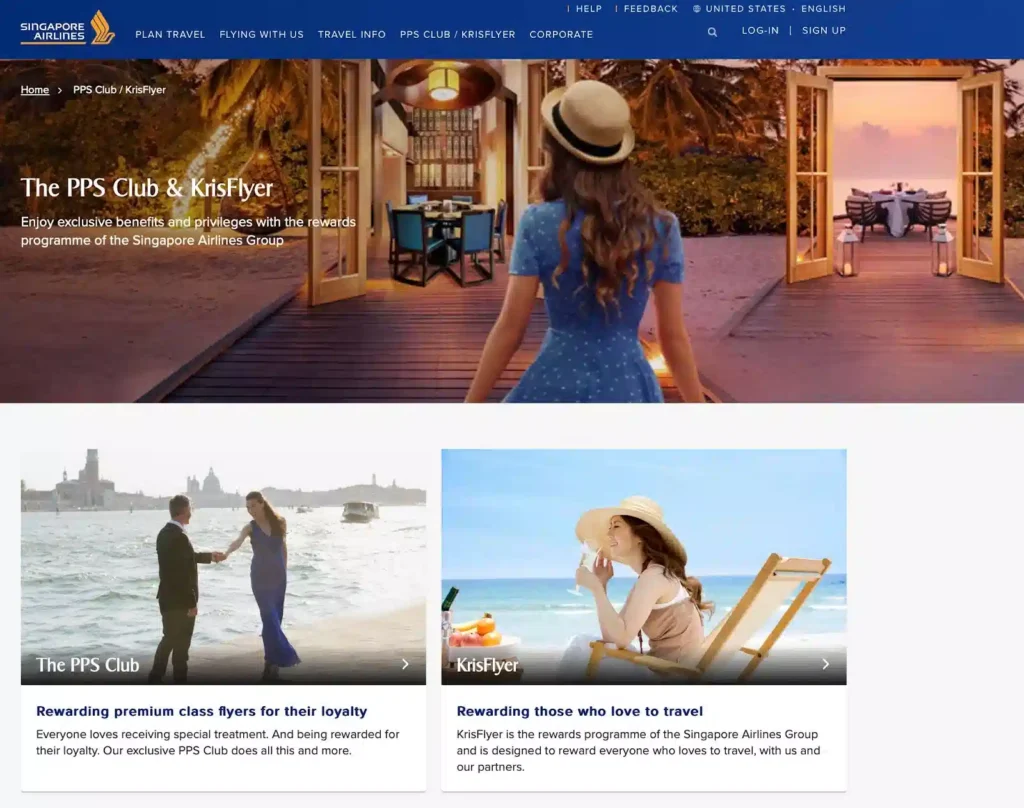 A woman in a blue dress and hat enjoys a sunset view from an elegant outdoor dining area, framed by open doors.