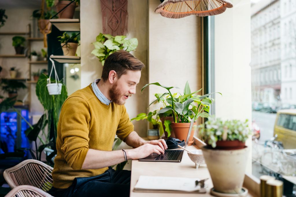 man sitting at desk