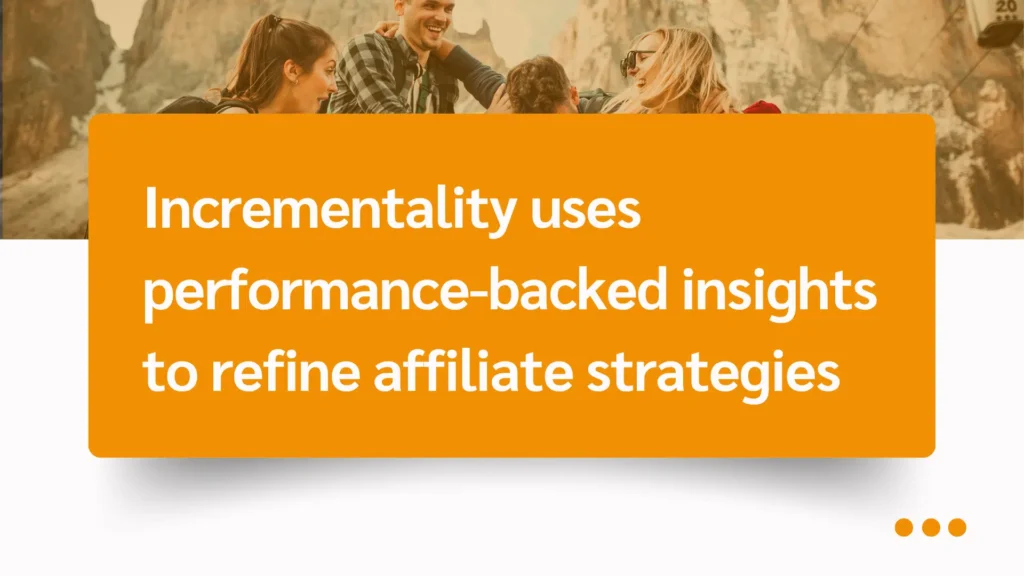 A group of people engaged in discussion outdoors with mountains in the background, sharing ideas on refining affiliate strategies.