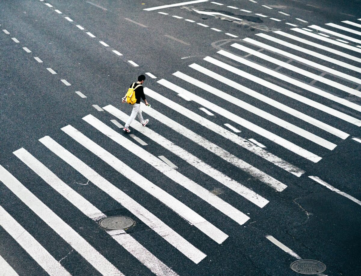 man walking on path