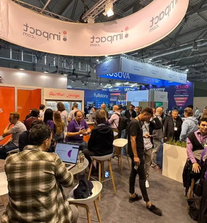 DMEXCO attendees speaking to discoverimpact.wpenginepowered.com staff