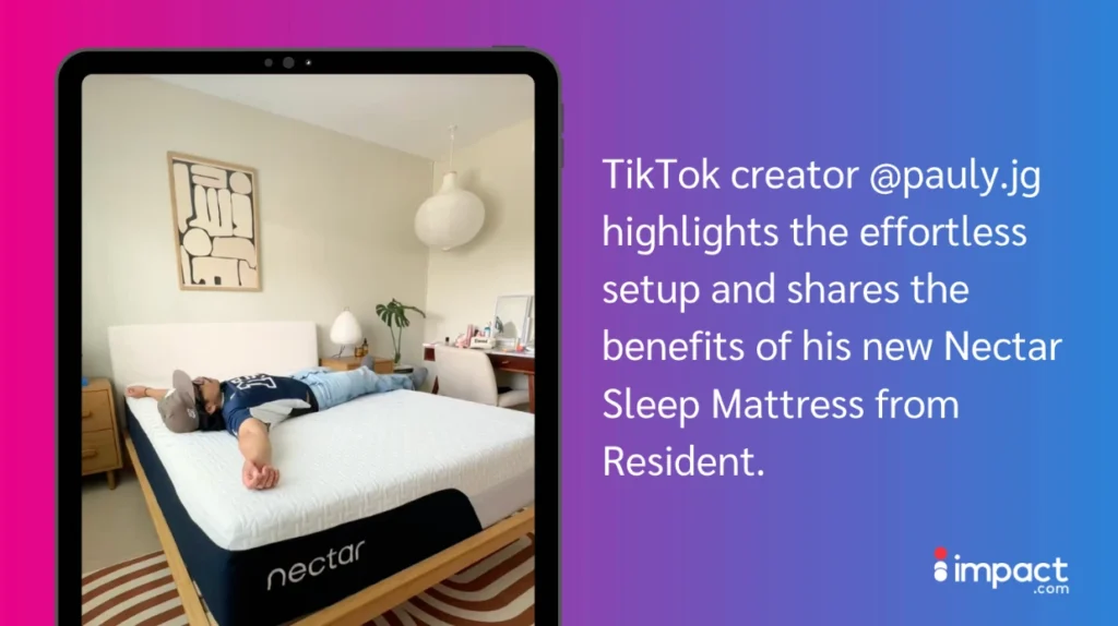 TikTok creator @pauly.jg relaxes on a new Nectar Sleep Mattress, showcasing its easy setup and comfort in a stylish room.