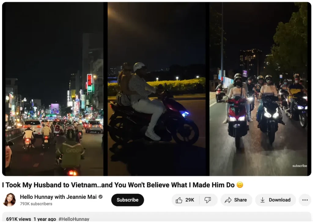 A vibrant nighttime street scene in Vietnam, showing bustling traffic and motorbikes under colorful neon lights.