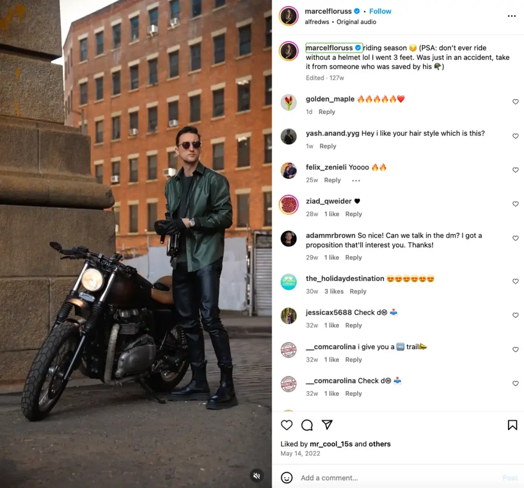 Marcel Floruss poses next to a motorcycle, exuding a sense of adventure and passion for riding.