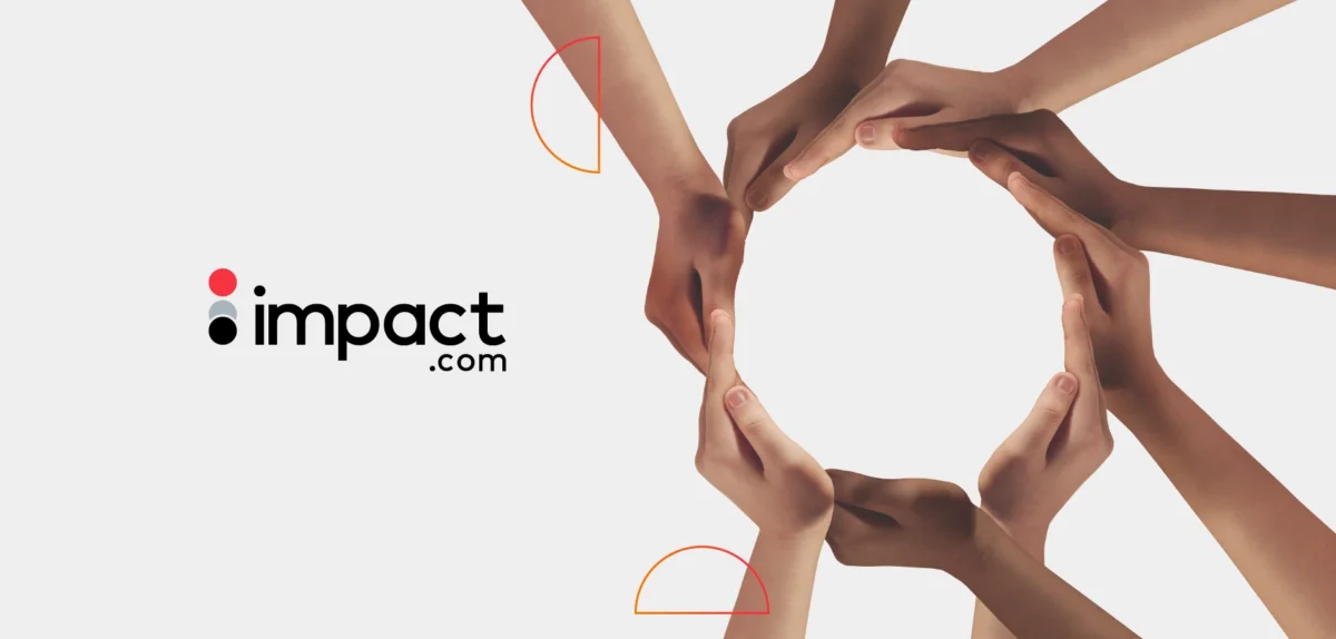 The discoverimpact.wpenginepowered.com logo accompanied by hands creating a circle, representing partnership and community in the marketing sector.