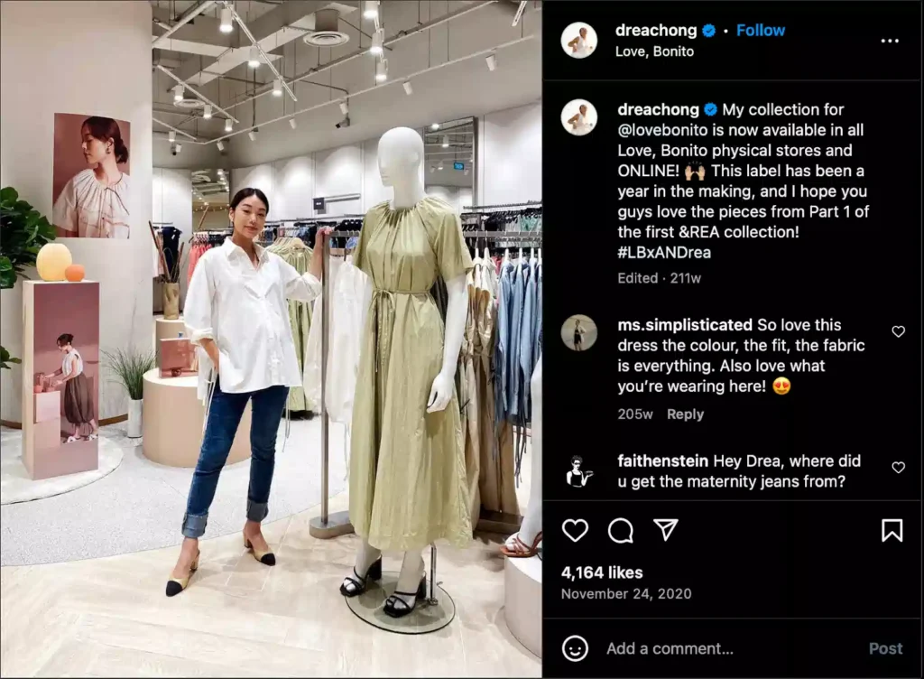 A stylish boutique featuring a mannequin dressed in a flowy green dress, with clothing racks and modern decor in the background.