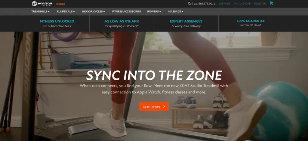 A person running on a Horizon Fitness treadmill, showcasing the 7.0AT model with a bright, inviting home gym setting.