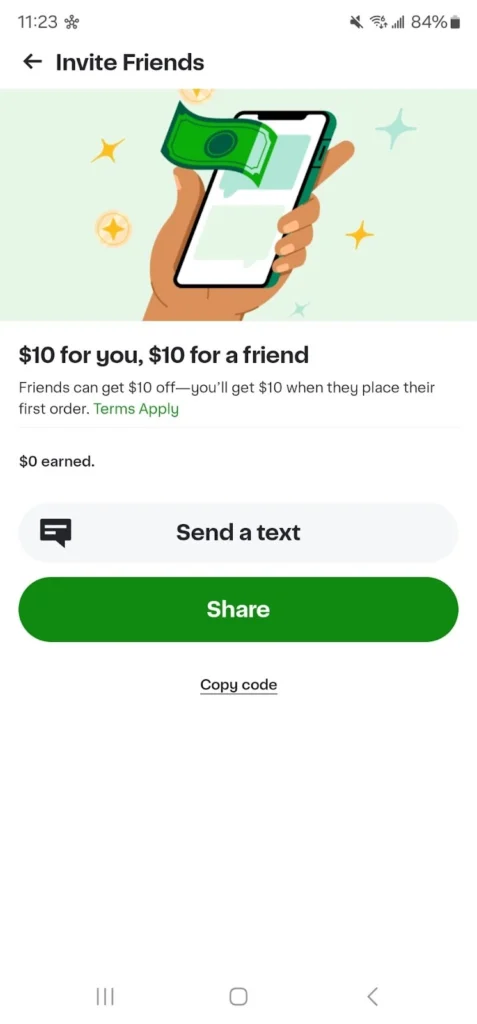 A hand holds a phone displaying a referral offer: "Get $10 for you and $10 for a friend" with options to share via text or copy the code.