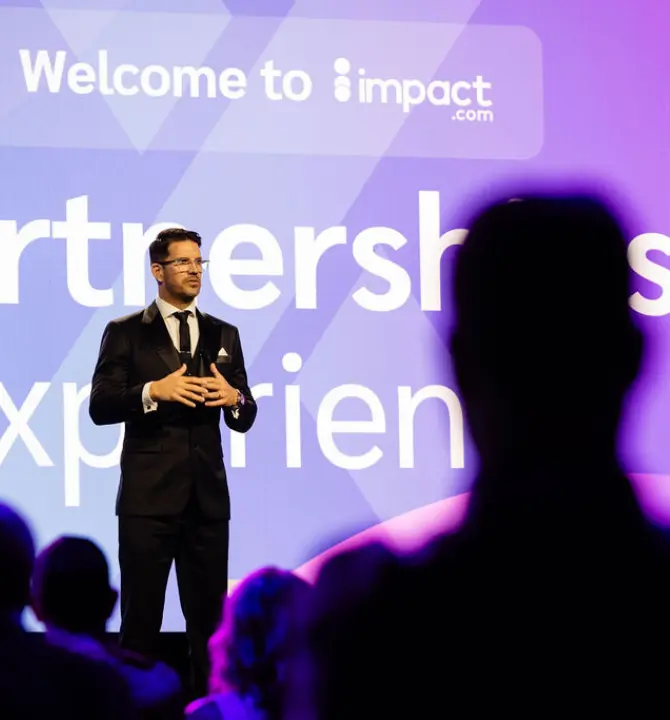 Adam Furness on stage at iPX25 event