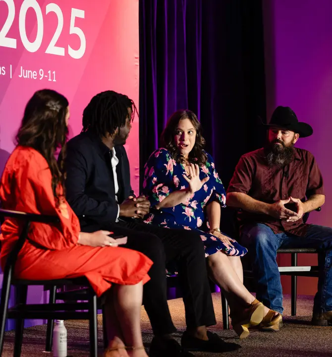 Guest speakers on stage at iPX25 event