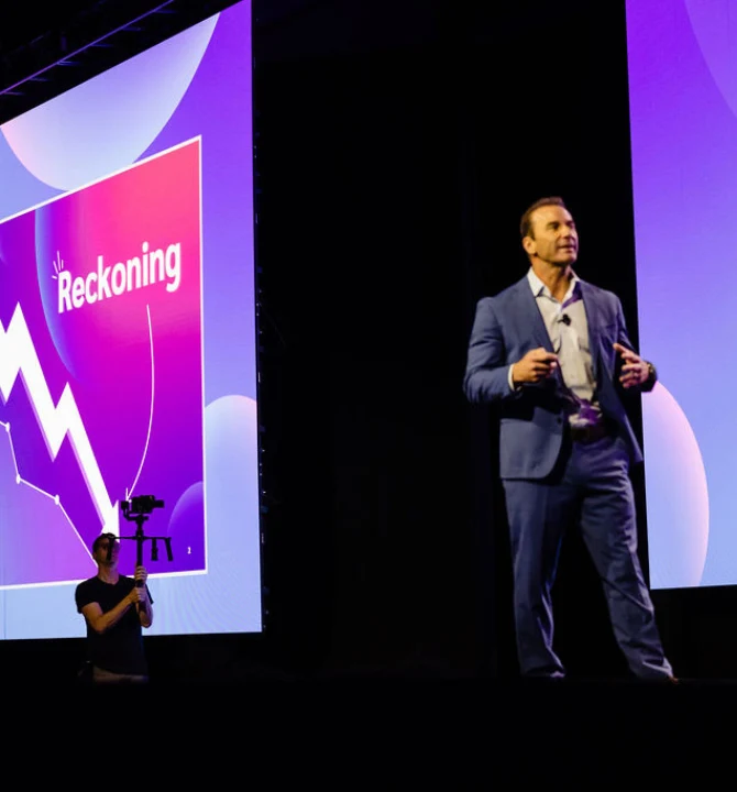 David A Yovanno on stage at iPX25