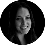 A woman with long, dark hair is depicted against a solid black background, conveying a sense of mystery and anonymity.